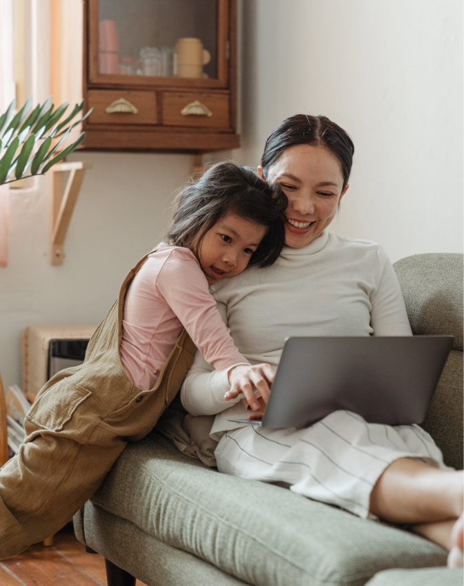 Parent and child sitting together at home
