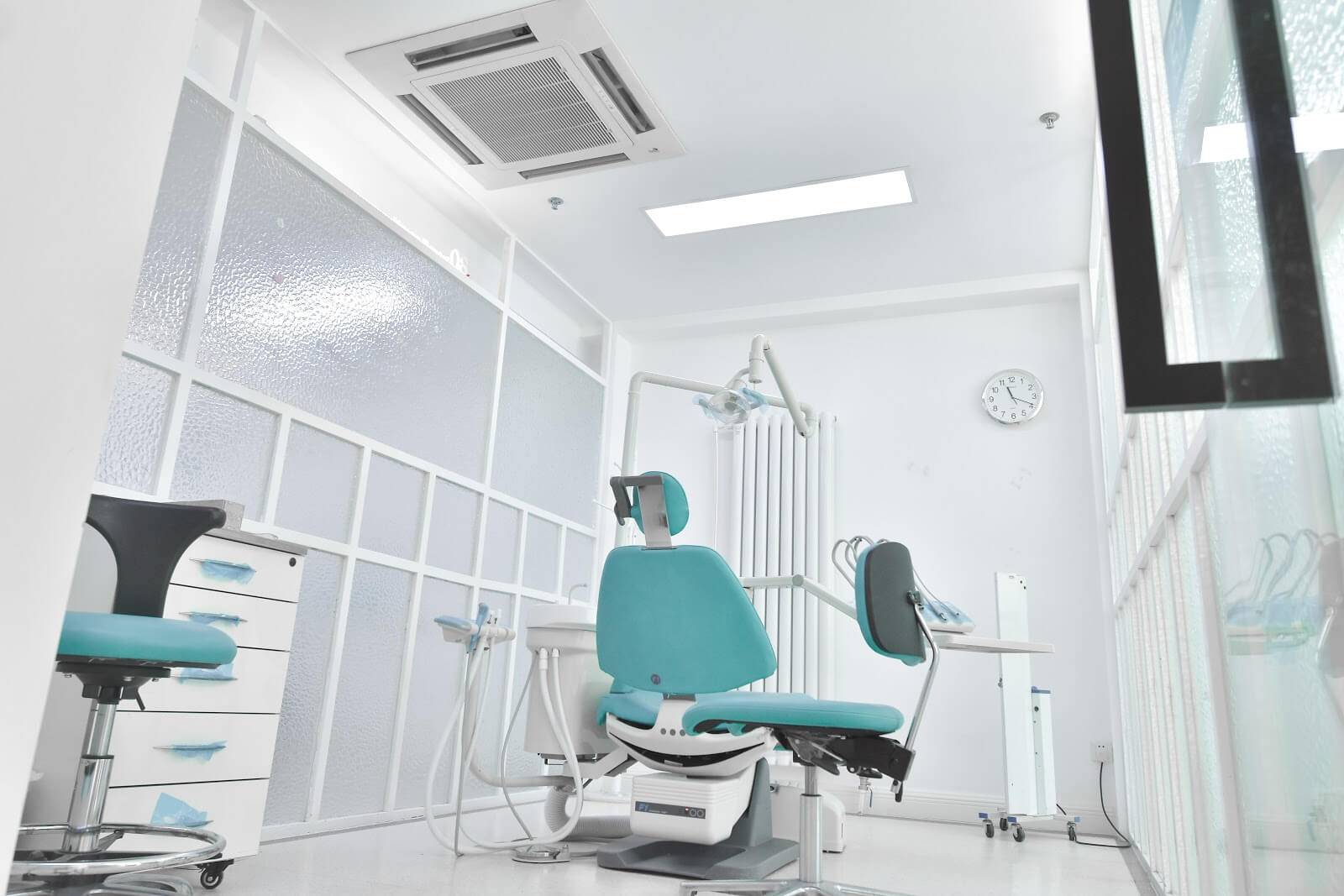a dentist chair in a white room