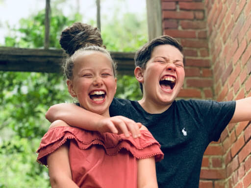 two kids laughing