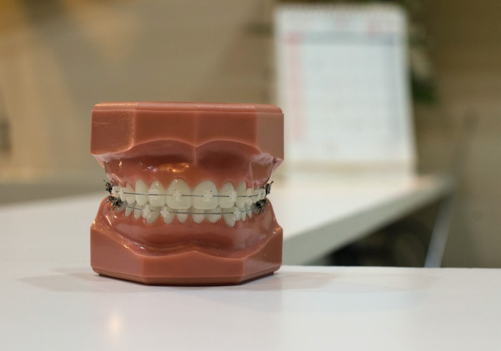 a set of fake teeth sitting on a desk